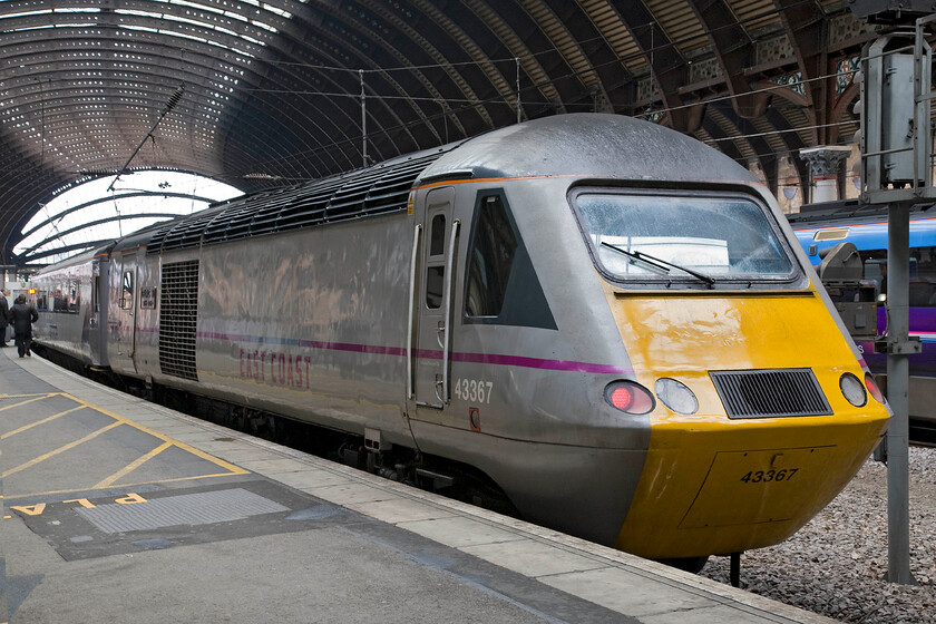 43367, GR 06.26 Edinburgh Waverley-London King's Cross (1E03), York station 
 On arrival at York station following the short morning walk from our hotel, I was greeted by the 06.26 Edinburgh to King's Cross HST standing at platform three. At the rear of the formation was 43367 'Deltic 50 1955-2005' in its East Coast livery. When initially named by GNER in 2005 it simply wore vinyl graphics that committed the '50' part of the name receiving its attractive cast plates later. 
 Keywords: 43367 06.26 Edinburgh Waverley-London King's Cross 1E03 York station East Coast HST Deltic 50 1955-2005