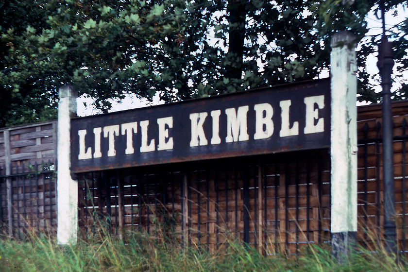 Running in board, Little Kimble station 
 The rather tatty looking running-in board at, erhhhhh, Little Kimble! This one is constructed of some sort of metal with the letters painted on rather than being of timber construction like a lot of the other GWR signs. The posts appear, however, to be of wood. Little Kimble is another small station on the short section of line between Aylesbury and Princes Risborough. 
 Keywords: Running in board, Little Kimble station