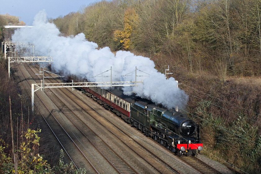 46100, 06.56 Crewe HS-Southall LSL (5Z70, 5E), Hyde Road bridge 
 46100 'Royal Scot' makes a fine sight as it storms through Roade cutting leading the 06.56 Crewe HS (LSL) to Southall LSL 5Z70 empty stock train. The crisp winter air combined with a locomotive working hard on the climb from Northampton, even in if 57002 was providing a shove at the rear, combined to produce a good show of exhaust. The empty stock was heading south to be used on a private LSL staff charter 
 Keywords: 46100 06.56 Crewe HS-Southall LSL 5Z70 Hyde Road bridge Royal Scot LMS