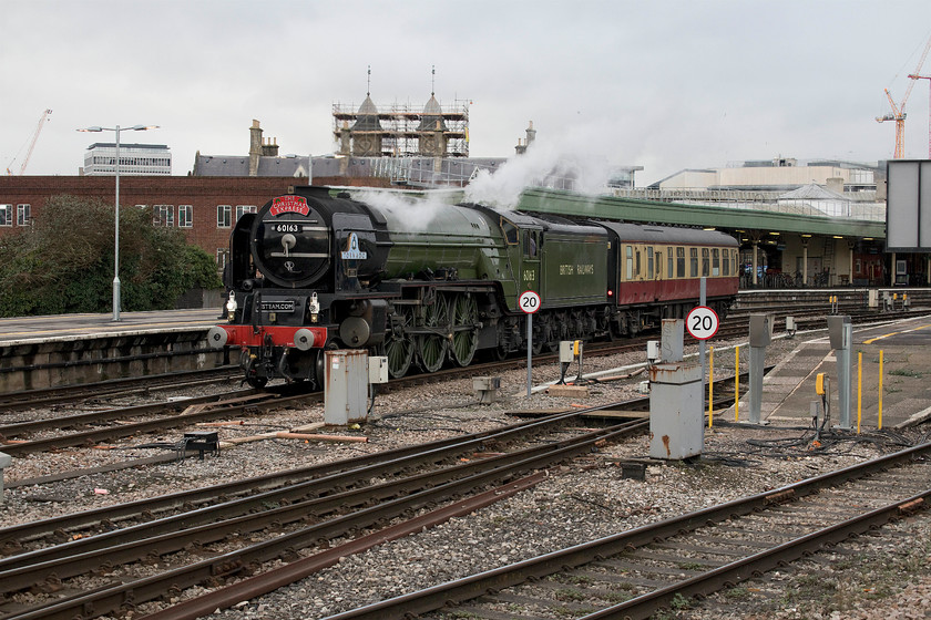 60163, 13.19 Bristol Temple Meads-Bristol East Depot, Bristol Temple Meads station 
 On arrival at Bristol Temple Meads, The Christmas Bath and Bristol Express charter, running as 1Z92 , had just arrived with A1 60163 'Tornado' leading. Having detached from the stock its is seen here with its support coach waiting for the green signal to run a short distance west from Temple Meads to then return to Bristol East Depot for servicing prior to it return later in the day. I remember the time when hundreds would turn up to see Tornado when it was new, now there were no more than half a dozen people observing it here and some of those were 'normals'! 
 Keywords: 60163 13.19 Bristol Temple Meads-Bristol East Depot Bristol Temple Meads station Tornado West Coast railways The Christmas Bath and Bristol Express
A1 Steam Locomotive Trust