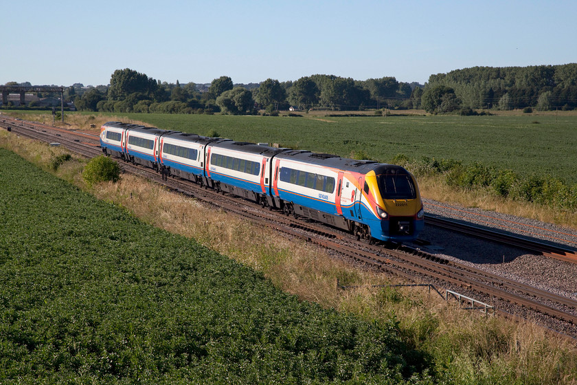 222011, EM 17.00 Sheffield-London St. Pancras (1C67, 7L), Harrowden Junction 
 In glorious summer sunshine 222011 passes Harrowden Junction between Wellingborough and Kettering forming the 17.00 Sheffield to London St. Pancras. 
 Keywords: 222 011 1C67 Harrowden Junction