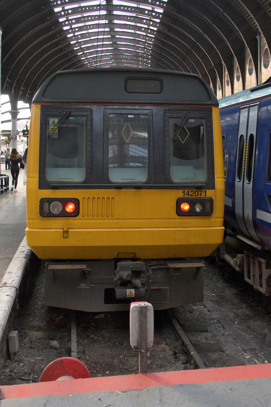 142071, NT 10.50 York-Hull (2R94, 4E), York station 
 Pacer 142071 sits at the back of the 10.50 to Hull at York station with 153334 at the front. It will soon leave platform six heading south-east to its destination. In theory, in seven week's time, this elderly and much-hated 'bus on wheels' as they are dubbed, should be out of service and heading for an appointment with the cutter's torch! However, late delivery of their replacements means that Northern have had to apply for special dispensation for them to operate beyong 31.12.19. 
 Keywords: 142071 10.50 York-Hull 2R94 York station Pacer