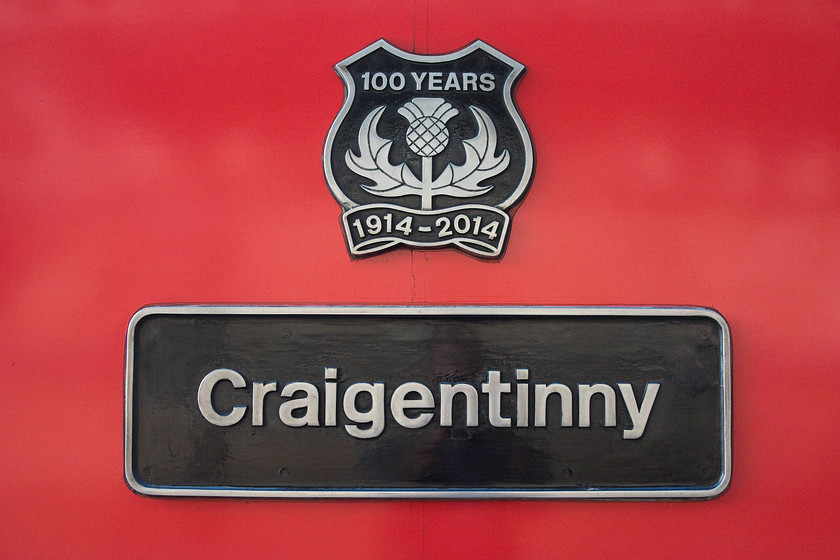 Nameplate, 43300, GR 09.30 Edinburgh Waverley-London King s Cross (1E09), Edinburgh Waverley station 
 The nameplate and crest attached to the side of HST power car 43300. It was named 'Cragentinny' after the depot, just east of Edingburgh, ten years ago 2006 when it was operated by GNER. However, the crest and large '100 years' vinyls were added two years ago and certainly make for a dramatic look! 
 Keywords: Nameplate 43300 09.30 Edinburgh Waverley-London King's Cross 1E09 Edinburgh Waverley station