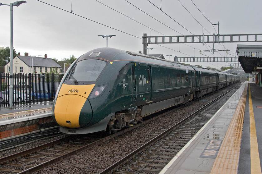 802101, GW 14.02 London Paddington-Bristol Temple Meads (1C17, 1L), Didcot Parkway station 
 In pouring rain GWR IET 801101 'Nancy Astor' leaves Didcot Parkway station working the 14.02 Paddington to Bristo, Temple Meads service. A 'going-away shot' has had to suffice due to a camera (or operator?) failure as the train was arriving a short time earlier. I am putting this down to the rain but it was probably more to do with my finger not pressing the shutter release button in time! 
 Keywords: 802101 14.02 London Paddington-Bristol Temple Meads 1C17 Didcot Parkway station GWR IET Nancy Astor