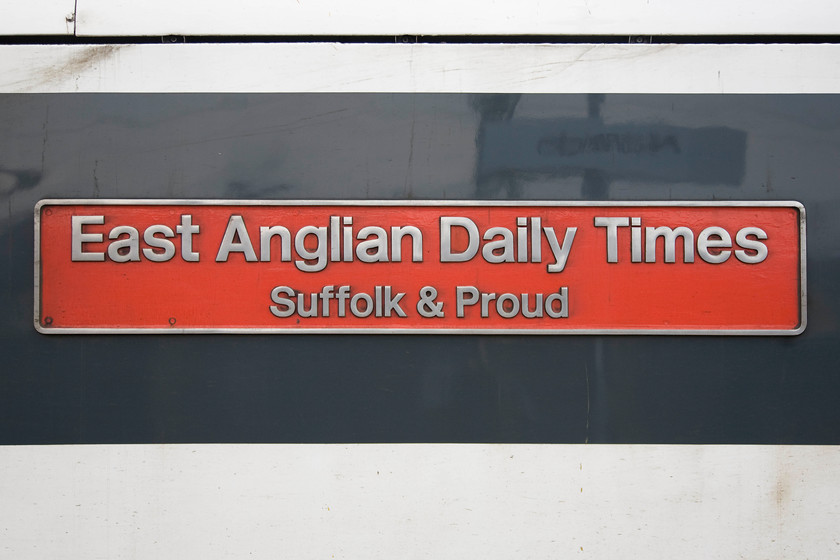 Nameplate, 90011, LE 16.00 Norwich-London Liverpool Street (1P51), Norwich station 
 A number of the Greater Anglia Class 90s are named carrying plates that reflect the part of the country through which they work. 90011's nmae, 'East Anglian Daily Times Suffolk & Proud', is quite a mouthful! 
 Keywords: Nameplate 9001116.00 Norwich-London Liverpool Street 1P51 Norwich station East Anglian Daily Times Suffolk & Proud