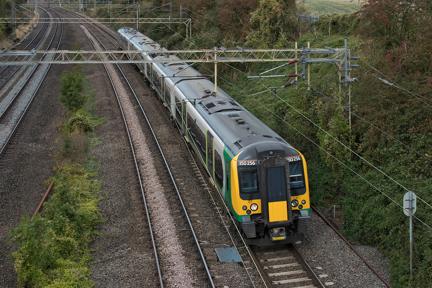 350256, LN 12.26 Northampton Milton Keynes ECS (5K20), Victoria Bridge 
 350256 takes the up slow line past Victoria Bridge just south of Roade with the 12.26 Northampton to Milton Keynes ECS working. 
 Keywords: 350256 5K20 Victoria Bridge