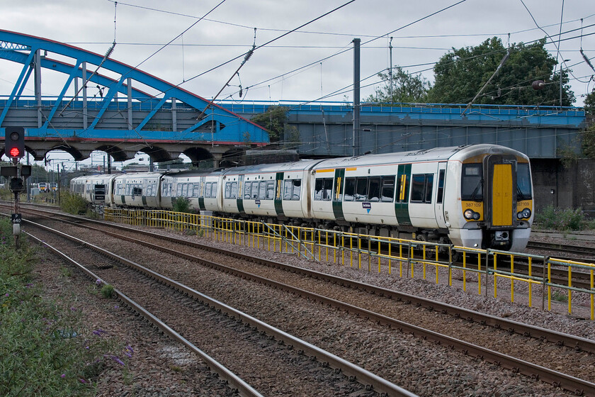 387109, GN 08.57 Peterborough Spital Sidings-Peterborough (5P85, 5L), Peterborough station 
 The Class 387 Electrostars have proved to be a dependable and highly successful design that is in use with a number of operators. Great Northern operates thirty-seven sets on various routes north of London. Having been stabled overnight 387109 leaves Spital sidings to pass through Peterborough station to then return south again into platform one as the 5P85 ECS move. 
 Keywords: 387109 08.57 Peterborough Spital Sidings-Peterborough 5P85 Peterborough station Great Northern