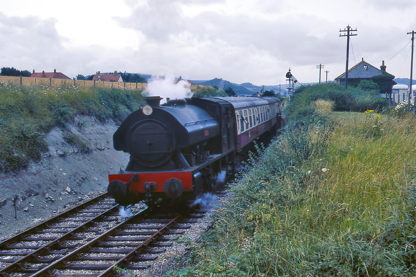 2996, 14.35 Minehead-Wiliton, Blue Anchor ST024433 
 Bagnall 0-6-0 2996 'Victor' leaves Blue Anchor with the 14.35 Minehead to Williton service. To get to this position I left the station and entered the Hoburne holiday park to then clamber over their fence. 2996 arrived on the WSR in 1976 after completing its commercial working life in SouthnWales and at Austin's Longbridge car plant in Birmingham. After covering twenty-four thousand miles it left the WSR in 1988 moving to various heritage lines including the Strathspey Railway, GCR(N), the Battlefield Line and now resides at the Lakeside and Haverthwaite Railway after receiving an overhaul in 2015.

There is an audio recording of this event on my youtube channel, see...https://youtu.be/b54VtmJG-W8 
 Keywords: 2996 14.35 Minehead-Williton Blue Anchor ST024433 Victor WSR West Somerset Railway