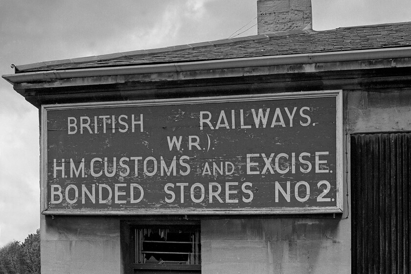 Wooden sign 
 This timber sign affixed to the side of the building immediately to the western end of Bath Green Park station was a remarkable survivor. With all other fixtures and fittings having been removed from the closed station quite why this remained is a mystery. Unfortunately, the building did not survive the redevelopment of the site with it being demolished and becoming part of the Sainsbury's supermarket car park. 
 Keywords: Wooden notice sign