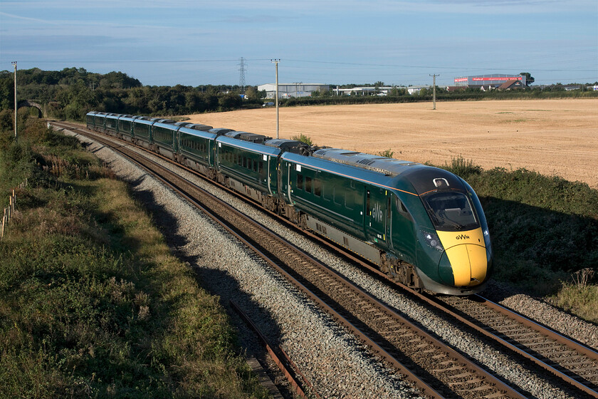 802107, GW 07.13 Paignton-London Paddington (1A74, 1L), Berkley ST808497 
 A nine coach IET set passes Berkley between Frome and Westbury working the 07.13 Paignton to Paddington service. The train is being worked by 802107 seen in lovely autumnal lighting. 
 Keywords: 802107 07.13 Paignton-London Paddington 1A74 Berkley ST808497 GWR IET