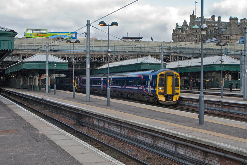 158730, unidentified working, Edinburgh Waverley station 
 Another unidentified ScotRail service departs from Edinburgh Waverley station. At such a busy station, over twenty million passengers recorded in the most recent statistics, keeping track of all train movements is a problem hence not being able to check what service 158730 was working on this particular afternoon! 
 Keywords: 158730 unidentified working Edinburgh Waverley station ScotRail