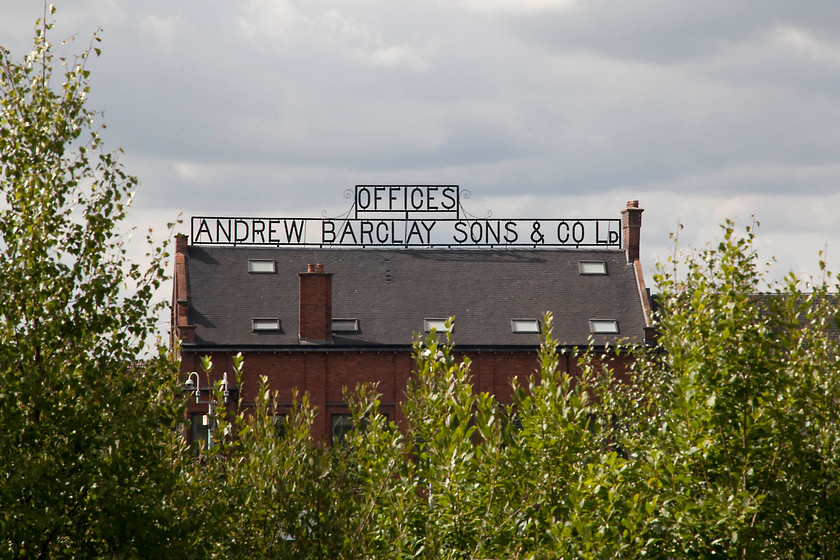 Name, above entrance to Andrew Barclay & Son factory, KIlmarnock 
 Sitting above the remains of the once extensive former Barclay works is the name of the former owner. This building, on Western Langlands Road, as well as counting private flats has a small museum relating to its history. The company built small tank engines and later diesel shunters many of which ended up in industrial settings.