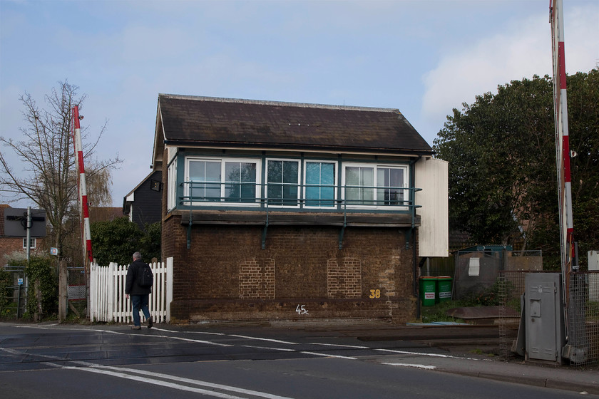 Sandwich Signal Box (SR, 1938) 
 This is the second box to occupy this site, this one being built by the Southern in 1938. In recent times it has had the inevitable Network Rail window treatment but still retains hints of the Saxby and Farmer original box that it replaced. The semaphores were superseded by colour lights relatively early in 1981 but at least the box remains as a crossing box. 
 Keywords: Sandwich Signal Box (SR, 1938)