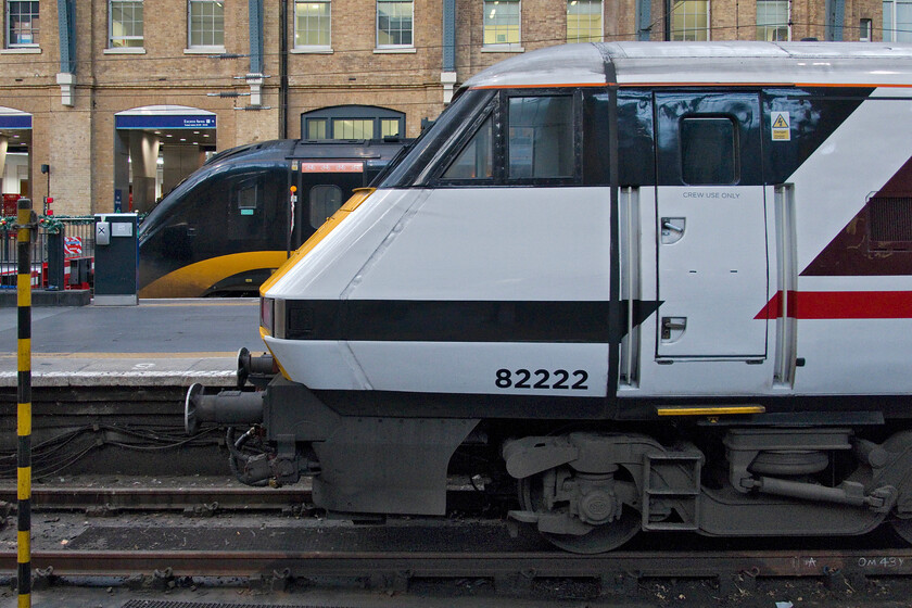 82222, GR 04.40 York-London King's Cross (1Y00, 2L) & 180106, GC 08.27 London King's Cross-Sunderland (1N90, RT), London King's Cross station 
 Grand Central is now the only operator using the Class 180 units increasing its interest in them by leasing two of the sets that went off-lease from East Midlands earlier this year. 180106 is seen on the blocks at King's Cross ready to work the 08.27 service to Sunderland. In the foreground, LNER DVT 82222 recently arrived leading the 1Y00 04.40 from York. 
 Keywords: 82222 04.40 York-London King's Cross 1Y00 180106 08.27 London King's Cross-Sunderland 1N90 London King's Cross station LNER DVT Grand central