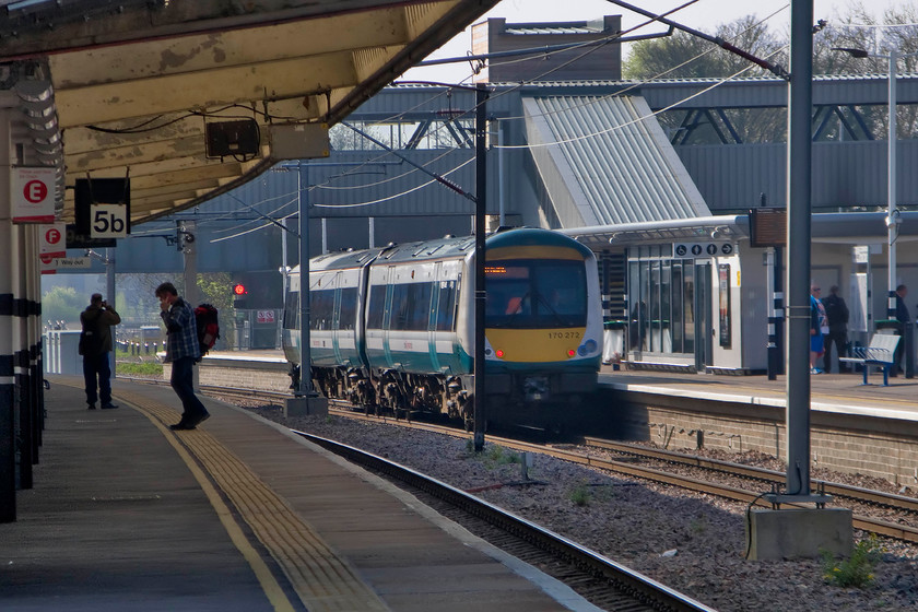 170272, LE 09.50 Peterborough-Ipswich (1L73), Peterborough station 
 My first visit to the recently expanded Peterborough station since its completion found it much larger than before with a completely new island platform, numbered six and seven. Here, Abellio GA's 170272 waits to depart eastward from the new platform six with the 09.50 local stopper service to Ipswich. 
 Keywords: 170272 09.50 Peterborough-Ipswich 1L73 Peterborough station Turbostar Abellio Greater Anglia