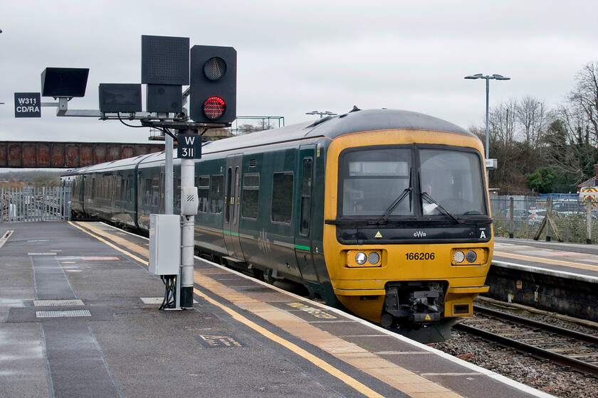 166206, GW 10.40 Gloucester-Weymouth (2O76, RT), Westbury station 
 GWR's 166206 arrives at Westbury station working the 10.40 Gloucester to Weymouth service. Following their displacement from the Thames Valley area, the Turbo units are now the mainstay of operations in the West Country and proving to be a step up from the Class 150s that have replaced here. 
 Keywords: 166206 10.40 Gloucester-Weymouth 2O76 Westbury station GWR Great Western Turbo