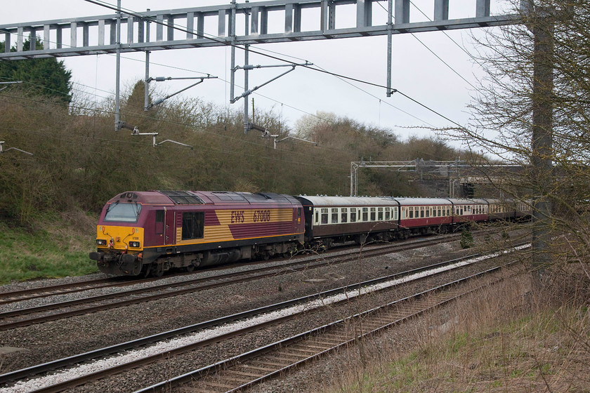 67008, outward leg of The Shoulder of Lune, London Euston-Heysham Harbour (1Z18), Ashton Road bridge 
 67008 brings up the rear of The Shoulder of Line railtour running from Euston to Heysham harbour as 1Z18. It is seen on the down fast just south of Roade in Northamptonshire. 
 Keywords: 67008 The Shoulder of Lune 1Z18 Ashton Road bridge