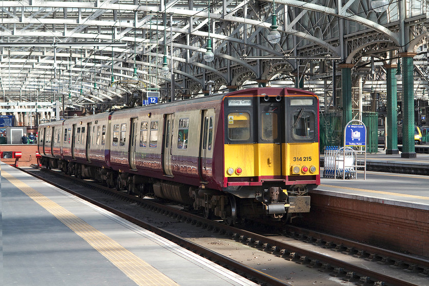 314215, SR 11.12 Glasgow Central-Paisley Canal, Glasgow Central station 
 314215 waits to leave Glasgow Central with the 11.12 to Paisley Canal. These veteran 1979 class 314s are on borrowed time now with ScotRail having ordered a fleet of new units that will precipitate their withdrawal. 
 Keywords: 314215 11.12 Glasgow Central-Paisley Canal Glasgow Central station