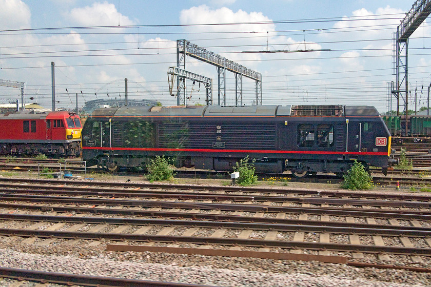 Class 92 & 67006, stabled, Wembley Yard 
 A DB class 92 stands behind 67006 'Royal Sovereign' in Wembley Yard. This 67 is one of a pair dedicated to Royal Train duties. 
 Keywords: Class 92 67006 Wembley Yard