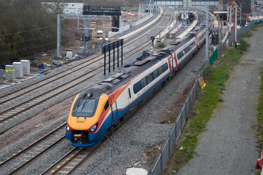 222021, EM 07.47 London St. Pancras-Corby (1M05, 8L), Wellingborough Driver Way bridge 
 Having made its stop at Wellingborough 222021 gets underway with the 07.47 St. Pancras to Corby 'stopper' service. Just north of Wellingborough, the Meridian will cross at Harrowden Junction onto the down slow to continue to Kettering and then Corby diverging from the MML at Kettering North Junction. When the slow lines are fully re-opened here at Wellingborough these services will utilise them all the way to and from Bedford and using the old platform three (down trains) and the new platform four (up trains). 
 Keywords: 222021 07.47 London St. Pancras-Corby 1M05 Driver Way bridge Wellingborough Meridian Eat Midlands Railway