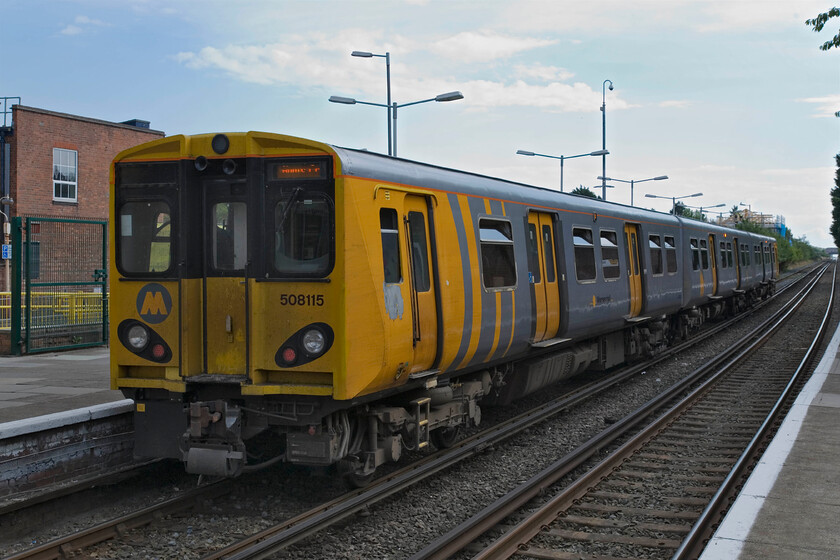 508115, ME 16.58 Southport-Hunts Cross, Birkdale station 
 The 16.58 Southport to Hunts Cross Merseyrail service departs from Birkdale station. On this warm and pleasant evening, it is a shame that the sun has just disappeared behind some errant cloud drifting in from the Irish Sea. 
 Keywords: 508115 16.58 Southport-Hunts Cross Birkdale station Merseyrail