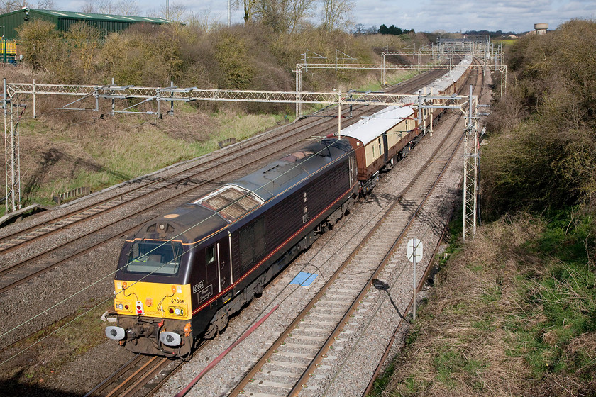 67006, 08.14 London Victoria-Runcorn Nagex (1Z39), Victoria bridge 
 67006 'Royal Sovereign' brings up the rear of the Pullman stock that is forming the 08.14 Victoria to Runcorn past Victoria bridge just south of Roade in Northamptonshire. It is carrying race-goers in some comfort to the Grand National at Aintree. Incidentally, the winner was Rule the World at 33/1 ridden by David Mullins. 
 Keywords: 67006 08.14 London Victoria-Runcorn Nagex 1Z39 Victoria bridge