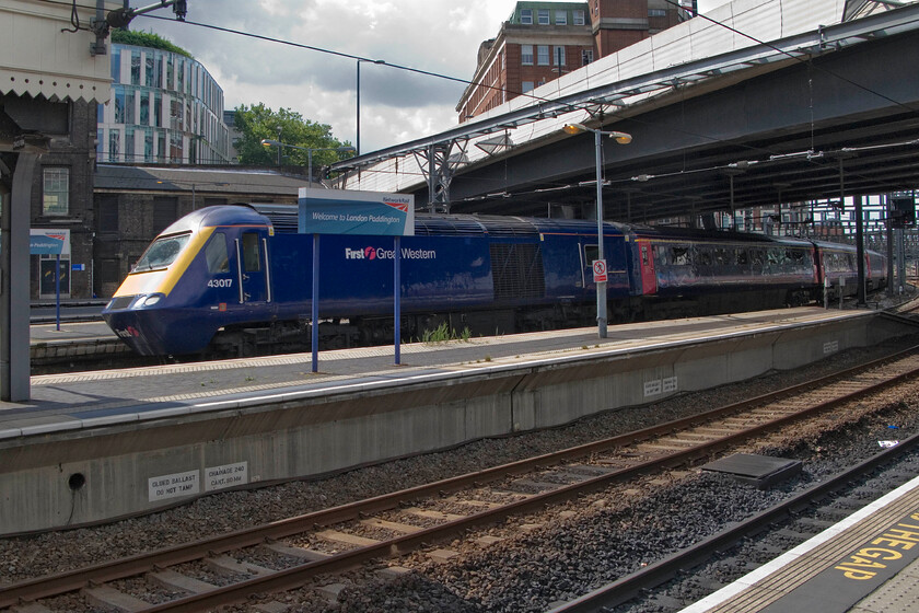 43017, GW 10.20 Swansea-London Paddington, London Paddington station 
 Completing its one hundred and ninety-mile journey from Wales the 10.20 ex Swansea HST service arrives at Paddington. The train is being led by one of the first batches of HST power cars that entered service in 1976 as part of set 253008, 43017. This has been in continuous operation on the GWML ever since giving nearly forty years of service a testament to Sir Kenneth Grange's design back in the early 1970s. 
 Keywords: 43017 10.20 Swansea-London Paddington London Paddington station