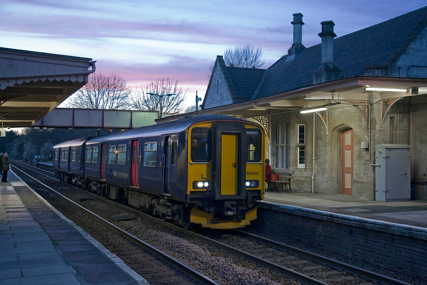 150216, GW 14.41 Gloucester-Westbury (2C20). Bradford-on-Avon station 
 156216 pauses at Bradford-on-Avon station working the 14.41 Gloucester to Westbury FGW service. I like taking photographs in these kinds of conditions as it brings some very subtle changes in the lighting that requires some judicious use of the camera's controls to capture the image at its best. In this particular photograph, I love the lighting in the evening sky. 
 Keywords: 150216 14.41 Gloucester-Westbury 2C20 Bradford-on-Avon station FGW First Great Western