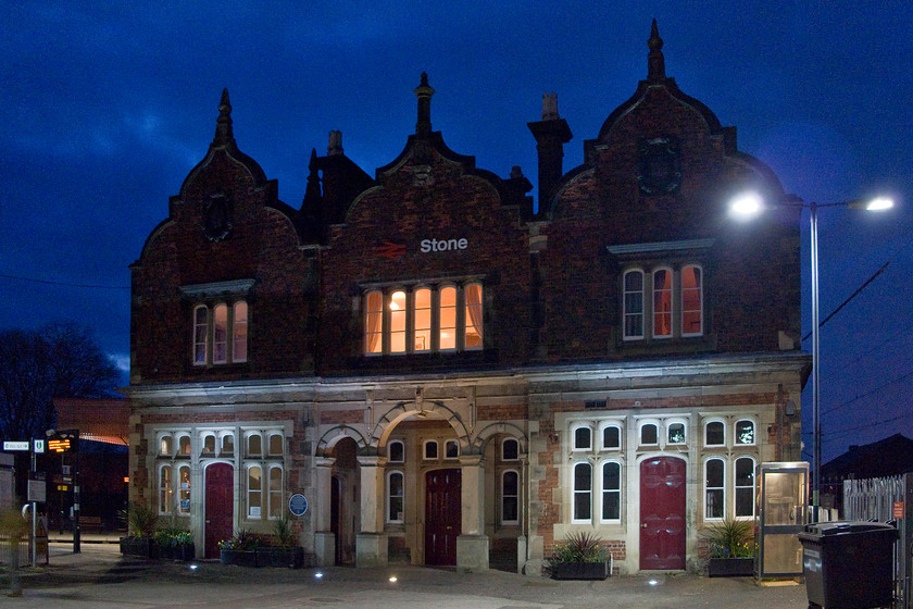 Frontage, Stone station 
 On the way up for our pre-trip night's accommodation, we stopped off at Stone's grade II listed station. Here is the station frontage that looks very grand in the artificial lighting. The building was opened in 1849 by the North Staffordshire Railway and sits within the angle of Colwich to Manchester spur of the West Coast Main Line's Stafford to Stoke-on-Trent route only having platforms serving this line. In recent times it has been taken over by Stone Town Council and is now in use as a community centre. Notice the blue plaque on the frontage giving an account of its history. 
 Keywords: Frontage Stone station