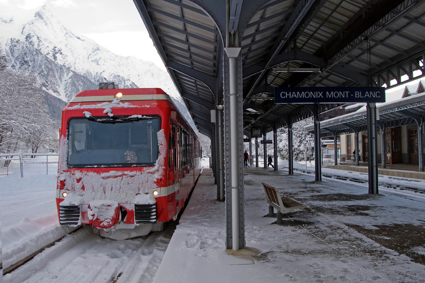 Z851, 11.54 Chamonix Mt. Blanc-Valloricine (18911), Chamoix Mt 
 Z851 was built by the Swiss manufacturer Stadler. and was introduced new to this line in 2008. They operate via 850V third rail DC pick up that is quite remarkable given the weather as seen here. Indeed, the third rail can be seen clear of all snow to the left of the train. If this was on our own Southern Region, all tarins would have been halted by now with absolute chaos ensuing! It looks like that the third rail is heated as there appears to be no snow on it. 
 Keywords: Z851 11.54 Chamonix Mt. Blanc-Valloricine 18911 Chamoix Mt. Blanc station