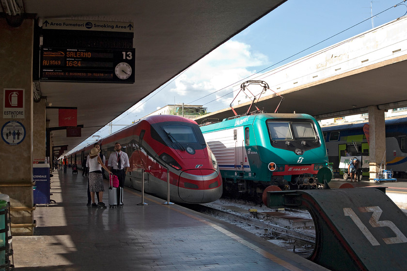 500.002, 13.20 Turin PN-Salerno (9569) & 464.447, 16.22 Florence SMN-Arezzo (23521), Florence SMN station 
 Two contrasting train services at platforms 13 and 14 of Florence SNM station. To the left is 500.002 about to leave with train 9569, the 13.20 Turin Porta Nuova to Salerno. Next to the ETR 500 at platform 14 is 464.447 about to leave with the 16.22 local stopper to Arezzo. 
 Keywords: 500.002 13.20 Turin PN-Salerno 9569 464.447 16.22 Florence SMN-Arezzo 23521 Florence SMN station