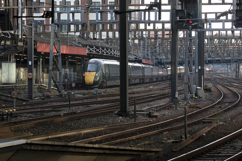 802107, GW 14.00 London Paddington-Bristol Temple Meads (1H67, RT), London Paddington station 
 Almost the clutter of the electrification paraphernalia in the throat of Paddington station, 802107 leaves the station working the 14.00 to Bristol Temple Meads. The IETs have changed both the look and the sound at Paddington since their squadron take over earlier this year. 
 Keywords: 802107 14.00 London Paddington-Bristol Temple Meads 1H67 London Paddington station Great Western Railway IET