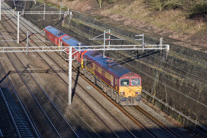 66002, 59204 & 59201, up LE crew training run, Bescot-Acton (0V03), Roade cutting 
 The passage of a Class 59 on the WCML is a pretty rare event so seeing two is even more unusual. 59204 and 59201 are towed by 66002 through Roade cutting running from Bescot to Acton as 0V03. According to postings on the internet, this was a crew training run but I can only see one other person in the cab of 66002 sitting in the second man's seat. 
 Keywords: 66002 59204 59201 crew training Bescot-Acton 0V03 Roade cutting