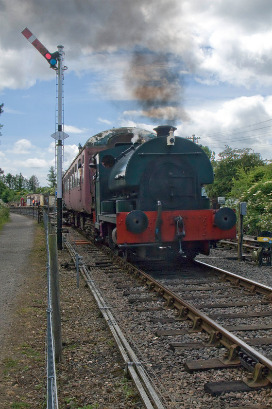 2104, 12.15 ex Pitsford Father`s Day special, Pitsford sidings 
 The 12.15 Pitsford return Father's Day special arrives at Pitsford and Brampton station. The train is being pushed by resident Peckett 2104. 
 Keywords: 2104 12.15 ex Pitsford Father`s Day special, Pitsford sidings Northampton and Lamport Railway NLR