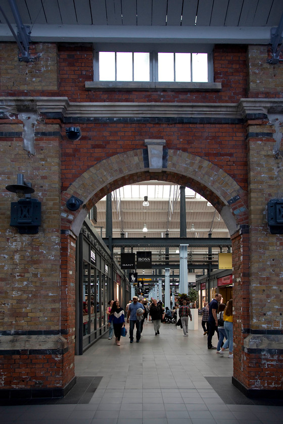 Interior, Swindon Outlet Village 
 An archway that would have gone through to one of the workshops inside the former Swindon Works. 
 Keywords: Swindon Outlet Village