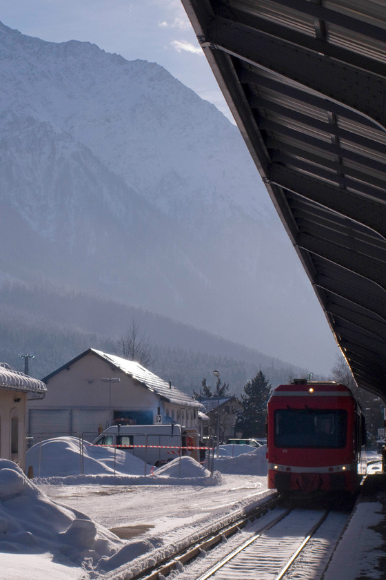 87353, 16.20 Chamonix Mt. Blanc-Vallorcine (18937), Chamonix Mt.-Blanc station 
 SNCF service 18937, the 16.20 Chamonix Mt. Blanc to Vallorcine, waits to leave Chamonix with the mountains towering above it. This service is formed by one of the newer Stadler Z850 units, 87353. The railway winds its way through the high Alps under the Mont Blanc Express brand operated by the French state railway, SNCF. At its steepest, the line climbs at an eye-watering 9% that is 1:11 in UK terms, at its steepest, Lickey Incline is a mere 1:37! 
 Keywords: 87353 16.20 Chamonix Mt. Blanc-Vallorcine 18937 Chamonix Mt.-Blanc station