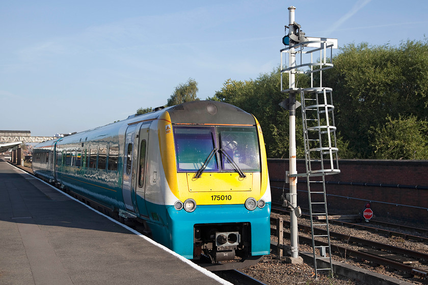 175010, AW 07.30 Manchester Piccadilly-Carmarthen (1V35), Shrewsbury station 
 175010 leaves Shrewsbury station with the 07.30 Manchester Piccadilly to Carmarthen. It is passing the up main home signal SBJ5. Unfortunately, health and safety has spoilt this WR tubular signal with the addition of a rather large protective cage style ladder. 
 Keywords: 175010 07.30 Manchester Piccadilly-Carmarthen 1V35 Shrewsbury station