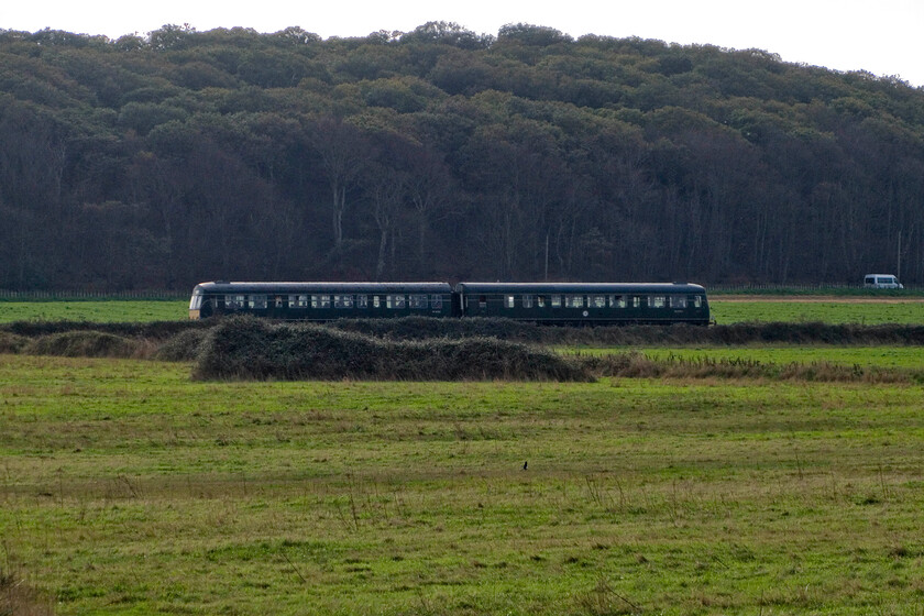 M51352 & M56192, 12.00 Holt-Sheringham, Dead Man's Hill TG138434 
 North Norfolk Railway resident Class 101 DMU (made up of M51352 & M56192) approaches Sheringham with the 12.00 ex-Holt service. The train has just passed under Dead Man's Hill accommodation bridge and will soon be skirting Sheringham Golf Course. 
 Keywords: M51352 M56192 12.00 Holt-Sheringham Dead Man's Hill TG138434