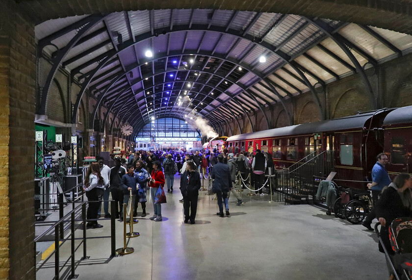 Reproduction of London King's Cross, Harry Potter World 
 My final view of the Harry Potter World King's Cross mock-up looks down its complete length. I have to applaud Warner Bros. studios who have created an impressive 'station' loosely based on the London terminus. Its roof, however, is not an authentic reproduction but it's still pretty good. Notice the Hogwarts Express stabled to the right composed of two former Mk. 1 coaches including 99721 99716. 
 Keywords: Reproduction of London King's Cross Harry Potter World