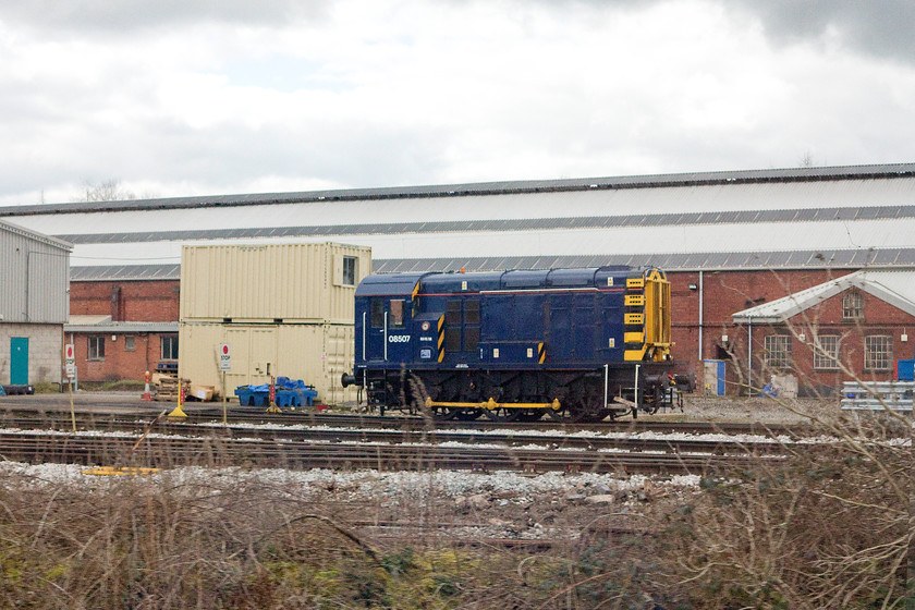 08507, stabled, LNWR depot, Crewe 
 08507 is seen stabled outside LNWR's facility at Crewe. 08507 was built at Doncaster in 1958 and moved to various depots throughout its life.It is now a Harry Needle Railroad Company locomotive and is use around Crewe fro the shunting of stock. 
 Keywords: 08507 LNWR depot Crewe