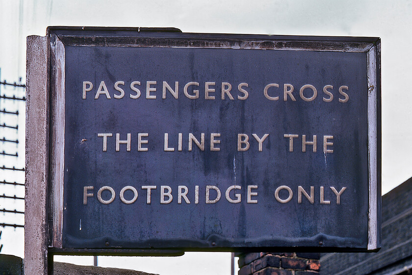 Enamel, Brocklesby station 
 I stand to be corrected but I believe that this large enamel sign at Brocklesbury station is of LNER heritage rather than of the later BR blue type due to its non-flanged edges and the subtly different font that appears slightly raised in profile. The sign stands at the bottom of the passenger access steps that led from the road to the up platform. So, technically it is asking passengers to do something that was not possible as there was no actual footbridge on the station with passengers having to use the pedestrian pavement along the side of the B1211 road. 
 Keywords: Enamel Brocklesby station BR Eastern enamel LNER