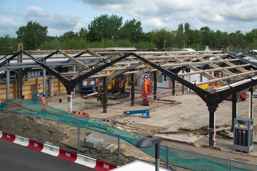 Demolition of old Northampton station 
 Work continues apace to demolish the old station building at Northampton taken from the concourse of the new one that was opened some five months previously. 
 Keywords: Demolition of old Northampton station