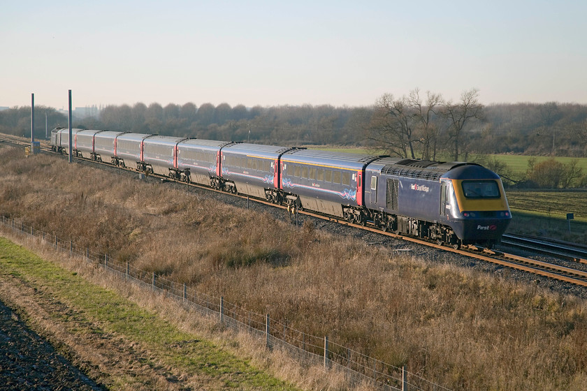 43070 & 43153 GW 13.45 London Paddington-Swansea (1B40), Bourton SU228874 
 As the sun gets low in the sky a final look, a metaphor for the end of an era perhaps, at the view west from Bourton before it is taken over by masts. 43070 and 43153 work the 13.45 Paddington to Swansea. 
 Keywords: 43070 43153 13.45 London Paddington-Swansea 1B40 Bourton SU228874