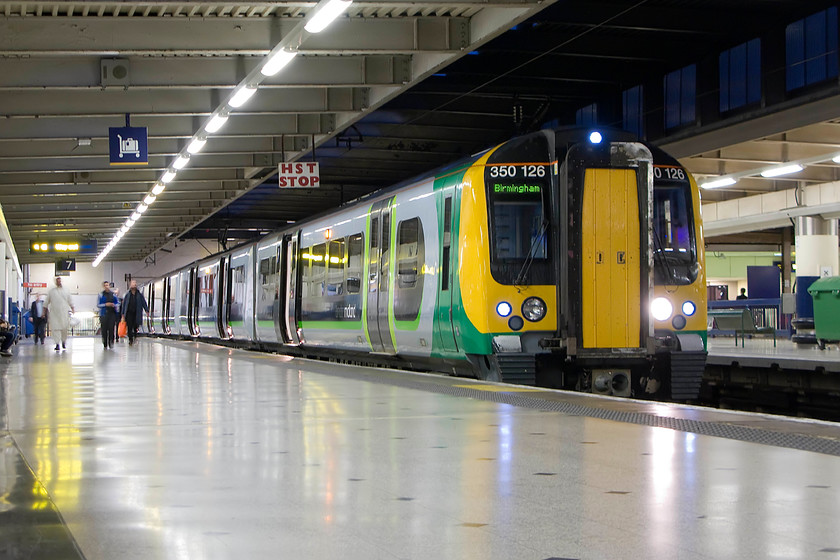 350126, LM 19.49 London Euston-Birmingham New Street (1Y79), London Euston station 
 Our train home from Northampton is going to be crowded this evening! Hopefull my wife had 'bagged' a seat for me whilst I take this photograph of 350126 waiting at platform seven. Normally the 19.49 to Birmingham New Street is a two-set service with eight carriages but today it is half this. Even when working as planned it is full and standing as far as Watford Junction but tonight some people will not be permitted to travel! 
 Keywords: 350126 19.49 London Euston-Birmingham New Street 1Y79 London Euston station London Midland Desiro