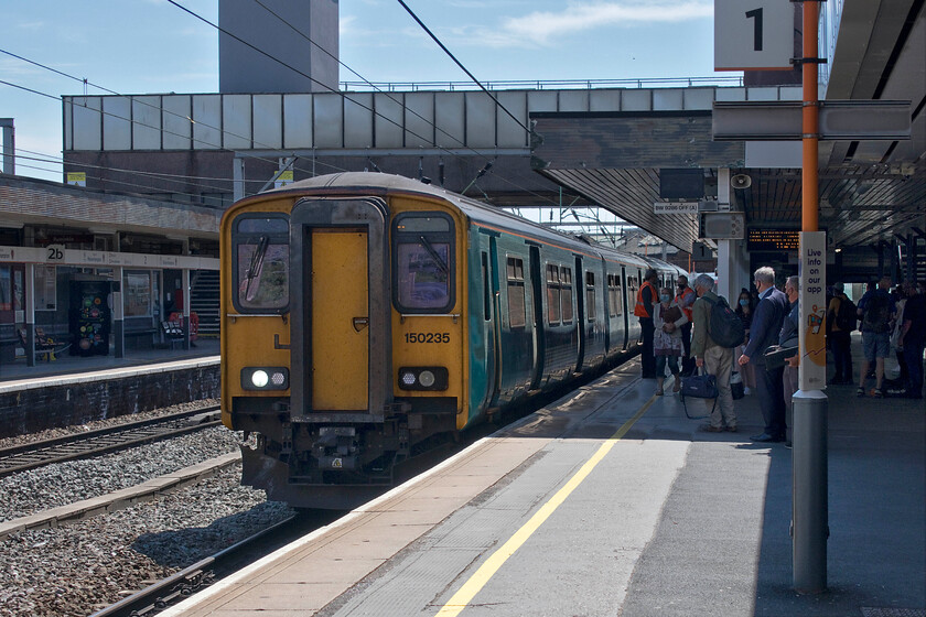 150235, AW 11.06 Birmingham New Street-Holyhead (1D13, 4E), Wolverhampton station 
 The next train of our West Midlands foray arrives at Wolverhampton station. We travelled aboard a crowded 11.06 Birmingham New Street to Holyhead as far as Shewsbury being worked by 150235 and another one attached to the rear. The elderly unit, dating from 1984, arrives at Wolverhampton still wearing its ATW livery. Boarding one of these trains now feels like travelling in a previous era with more modern trains now being so much better in every respect. This service was crowded and felt a little uncomfortable as the COVID guidelines were difficult to adhere to. Andy and I were forced to sit in the small single seats adjacent to the lavatory. Interestingly, the WiFi worked well throughout the journey but it was still somewhat of a relief to reach Shrewsbury and I certainly would not have fancied continuing on to its destination all the way to Anglesey!

Journey score 5/10 
 Keywords: 150235 11.06 Birmingham New Street-Holyhead 1D13 Wolverhampton station Transport for Wales Rail