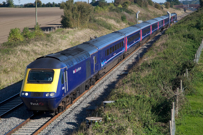 43186 & 43091, GW 13.00 London Paddington-Bristol Temple Meads (1C15), Bourton SU228874 
 The recent removal of an obtrusive 1970s signal gantry at this spot has opened it up nicely but, as can be seen, this will not be for long as there are a pair of pilings just level with the power car that will accommodate some huge electrification masts thus ruining the view again! 43186 and 43091 power the 13.00 Paddington to Bristol Temple Meads express past the village of Bourton on the Wiltshire and Oxfordshire county boundary. 
 Keywords: 43186 43091 13.00 London Paddington-Bristol Temple Meads 1C15 Bourton SU228874