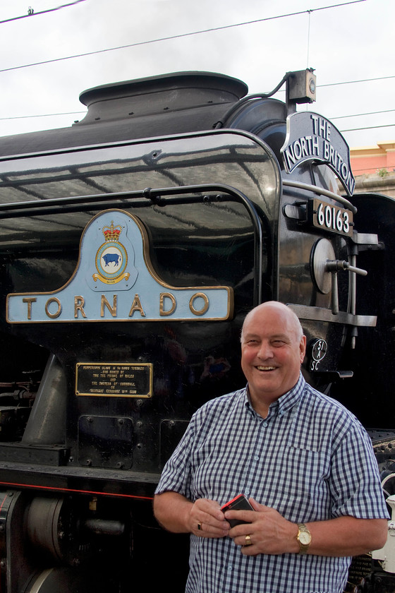 25. Jim Cardy, 60163, Carlisle station 
 A former and recently retired work colleague Jim Cardy, stands in front of 60163 'Tornado' at Carlisle station. He and three others in his party would enjoy haulage behind this fine locomotive along the Eden and Tyne valley as far as Newcastle. They were on the North Briton railtour that would end up at King's Cross being hauled by AC electric 86259 'Les Ross/Peter Pan' from Newcastle. It was great to meet up with Jim and his party at Carlisle and makes you realise how a love and interest in all things railway brings people together. 
 Keywords: Jim Cardy 60163 Carlisle station