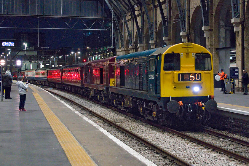 20189 & 20142, 06.42 Welwyn Garden City-London King's Cross (3Z39, 12L), London King's Cross station 
 Wearing a mysterious headcode 20189 leads 20142 'Sir John Betjeman' slowly into King's Cross' platform one working the 3Z39 empty stock from Welwyn Garden City. The stock would soon be filled with many enthusiasts and normals who just fancied a day out in Norwich working the 1Z39 charter to the famous East Anglian city. 
 Keywords: 20189 20142, 06.42 Welwyn Garden City-London King's Cross 3Z39 London King's Cross station Carols at Norwich Cathedral Sir John Betjeman