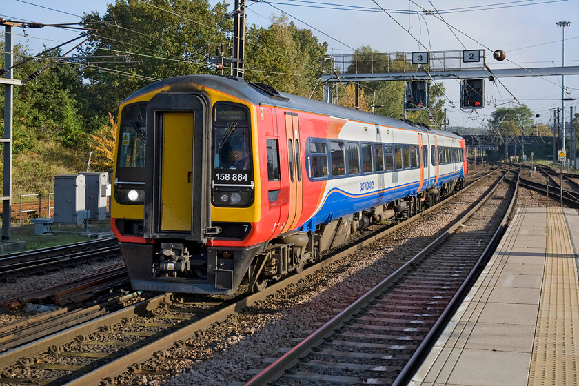 158864, EM 08.52 Liverpool Lime Street-Norwich (1L07), Norwich station 
 Just a few minutes after 158785 left for Merseyside working the 1R94 158864 arrives at journey's end having crossed the country from west to east. This train left Liverpool at 08.52 taking just over five hours to complete its journey. Whilst I like the BR built Class 158s are they really up to the job of such long journies? 
 Keywords: 158864 08.52 Liverpool Lime Street-Norwich 1L07 Norwich station EMT East Midlands Trains