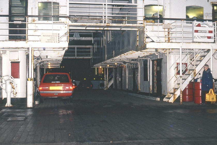 MV Farringford, car deck 
 The car deck of MV Farringford is seen as the vessel awaits to depart from Hull Corporation Pier for New Holland. When ordered by the Southern Railway just after the war for use on the Yarmouth to Lymington route it was designed as a straightforward drive on-drive off ferry capable of carrying thirty-two cars. However, when it was transferred to the Humber route in 1978 it was converted to sideloading with capacity increasing to forty cars. It is seen here waiting at Hull Corporation pier preparing to sail to New Holland 
 Keywords: MV Farringford car deck